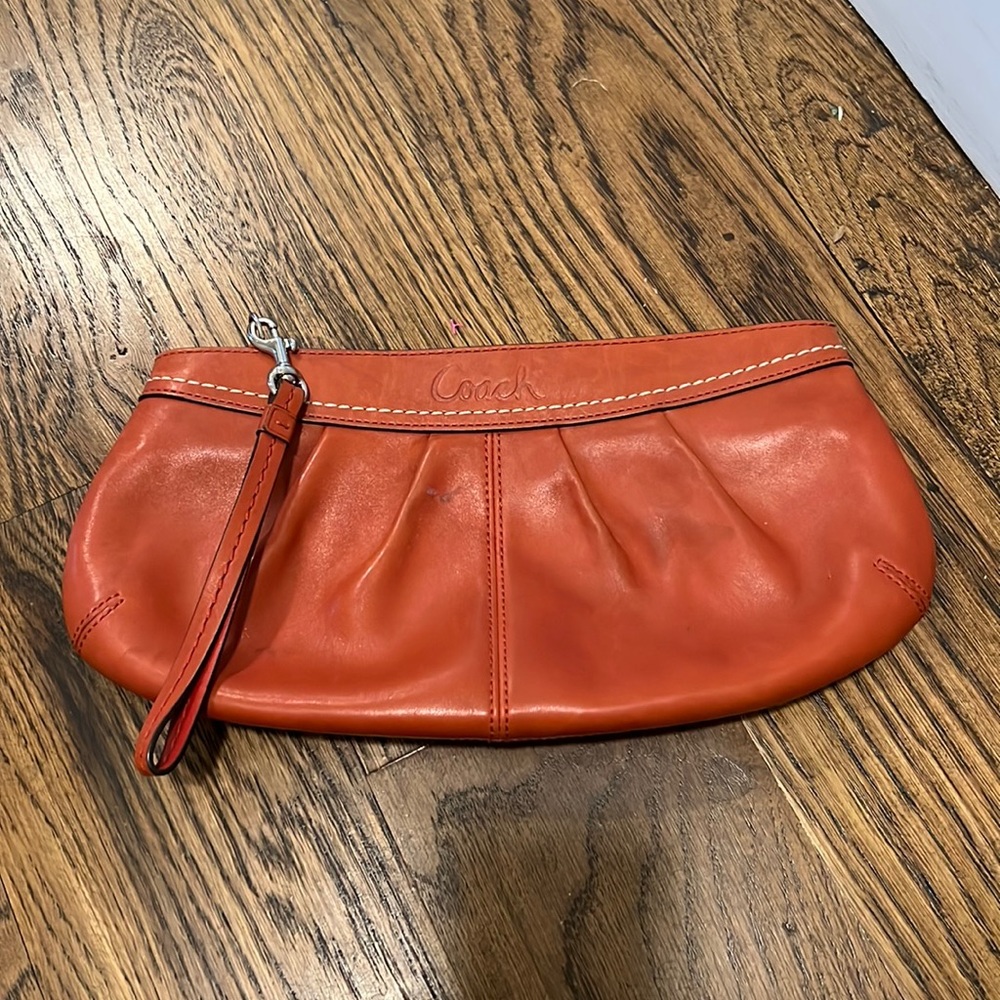 Burnt orange Coach Clutch